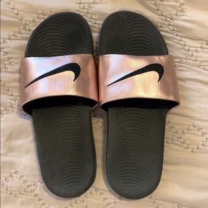Rose gold Nike slides